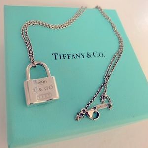 Tiffany & Co. 1837 Lock Pendant Charm Necklace with gift receipt and box.